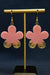 Pink flower-shaped earrings with gold accents