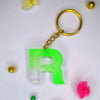 Trendy Green Transparent Resin Keychain with R Initial