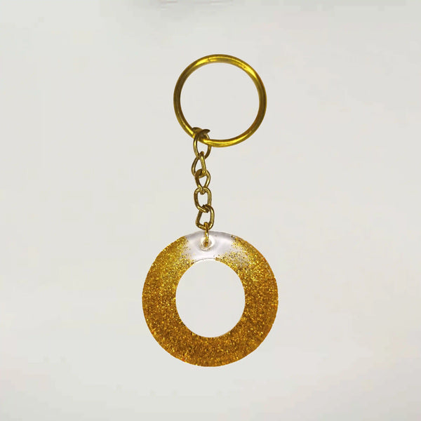 Stylish Golden Glitter Resin Keychain – Elegant "G" Initial