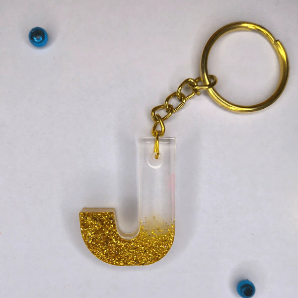 Stylish Golden Glitter Resin Keychain – Elegant "G" Initial