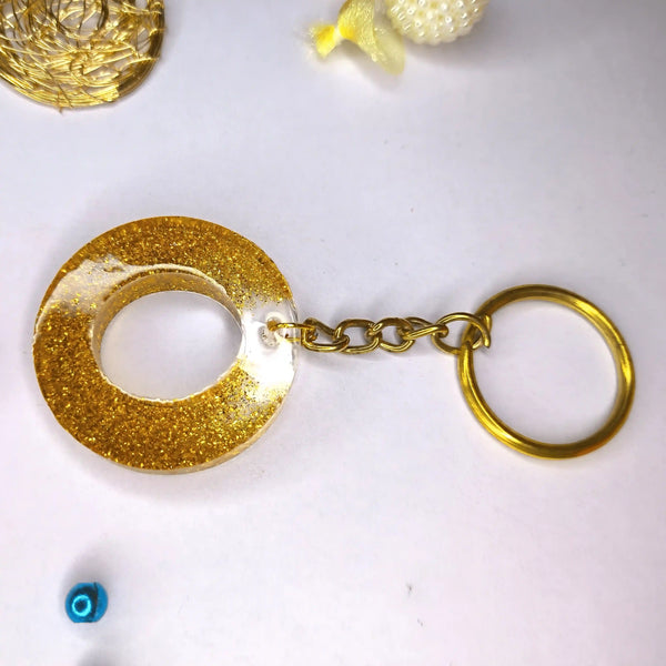 Stylish Golden Glitter Resin Keychain – Elegant "G" Initial