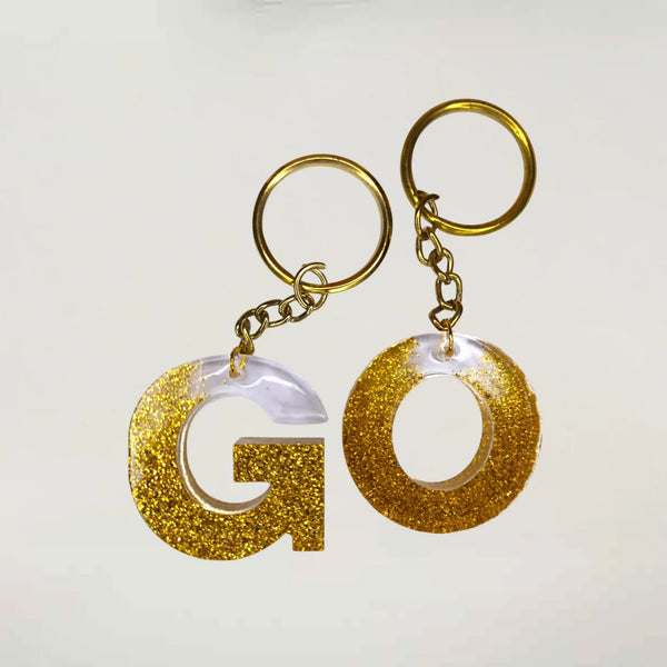 Stylish Golden Glitter Resin Keychain – Elegant "G" Initial