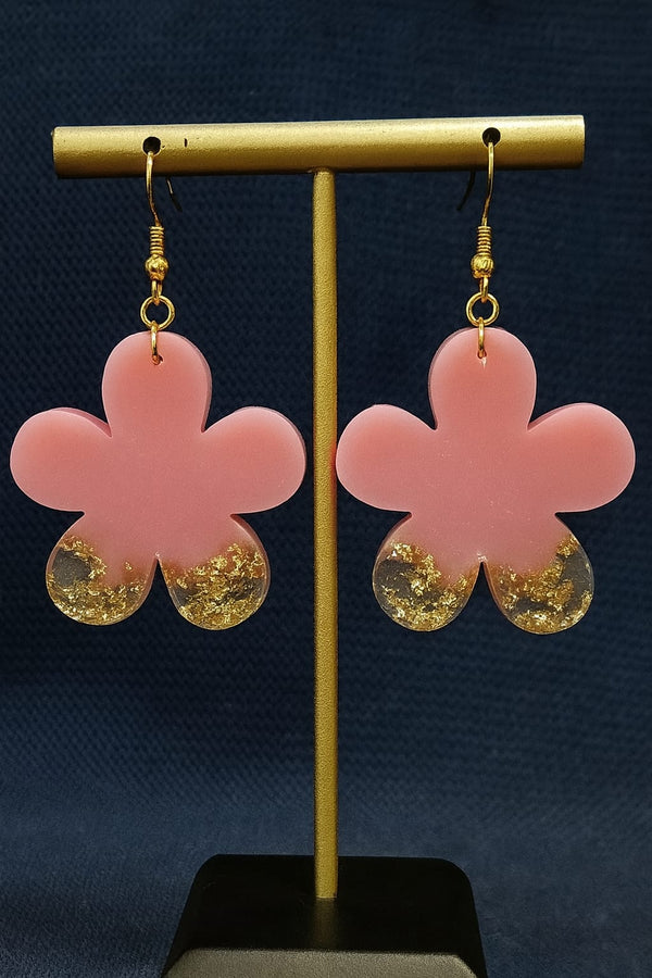 Pink flower-shaped earrings with gold accents